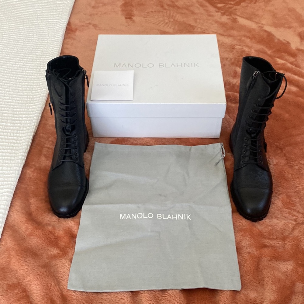 Manolo Blahnik black leather lace up boots.